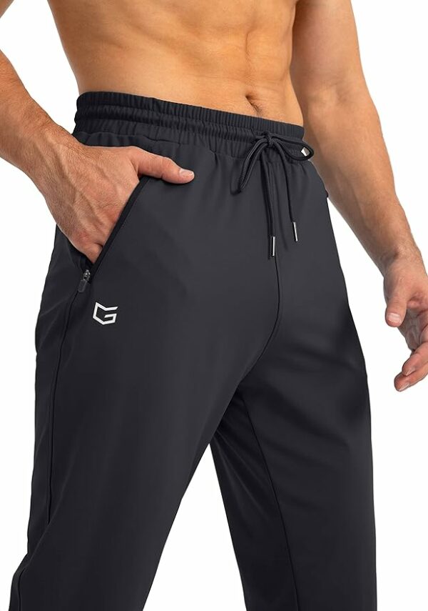 STRETCHY FABRIC: Comfortable, soft and 4-way stretch fabric, enhances the stretchability of sweatpants and increases the range of motion. 3 ZIPPER POCKETS: Zip pockets at sides and back for convenient and secure storage, allows you can comfortably enjoy the exercise time. ADJUSTABLE ELASTIC WAISTBAND: Elastic waistband and adjustable inner drawstring offer different people's custom fit. STYLISH DESIGN: The tapered leg design with enough length makes you look slim and athletic, open tapered leg allows pants to rest comfortably over shoes. VERSATILE & MULTI SWEATPANTS: G GRADUAL athletic sports sweatpants are perfect for workout, running, jogging, cycling, walking and lounging at home.